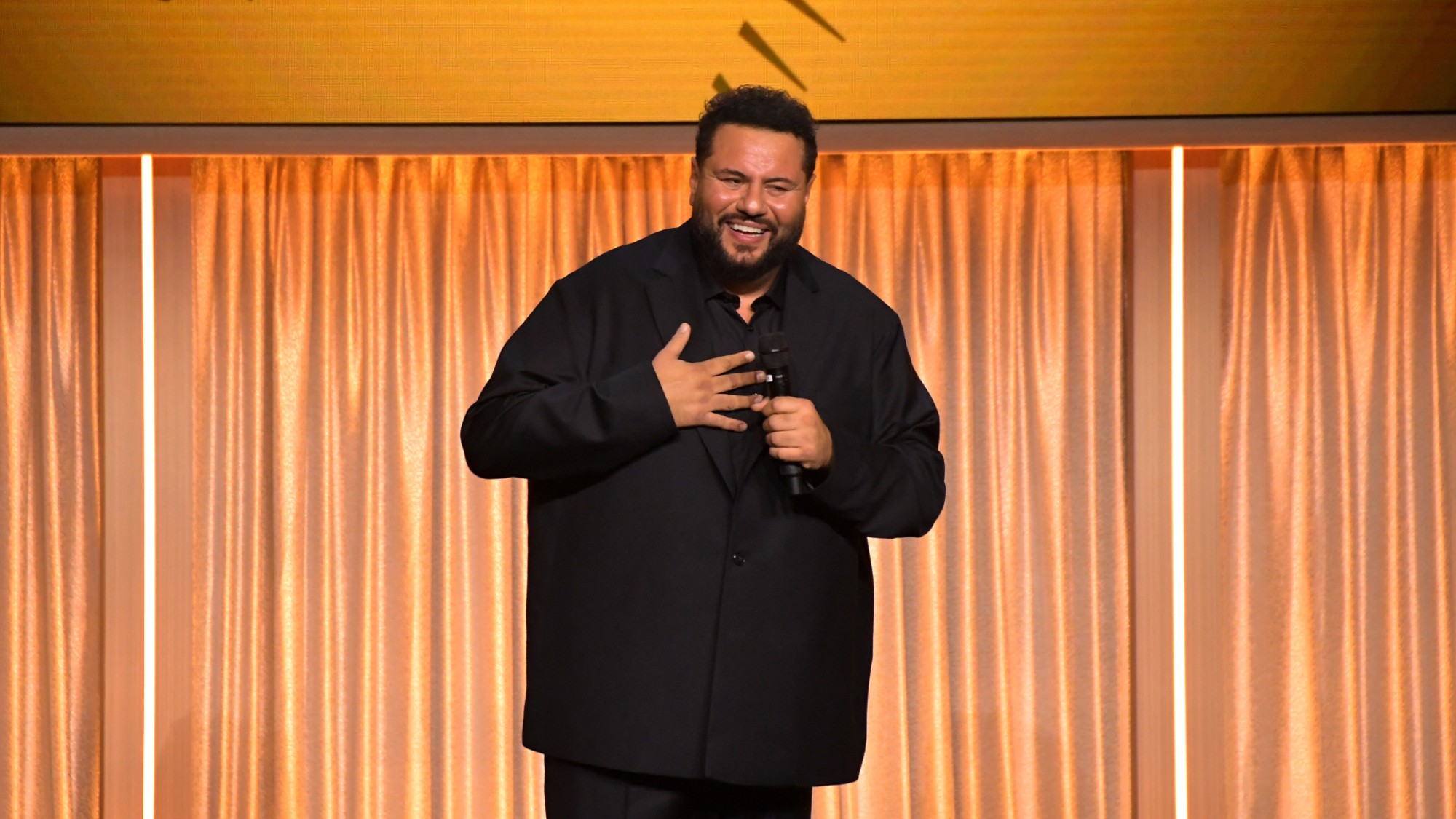 Mo Amer speaks at the 2026 Peabody Awards.