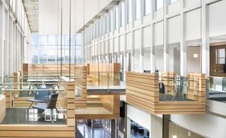 A closer look at the "hanging pods" that are suspended by steel cables and serve as spaces for studying.