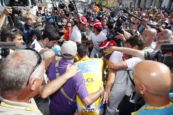 Contador is mobbed at the finish