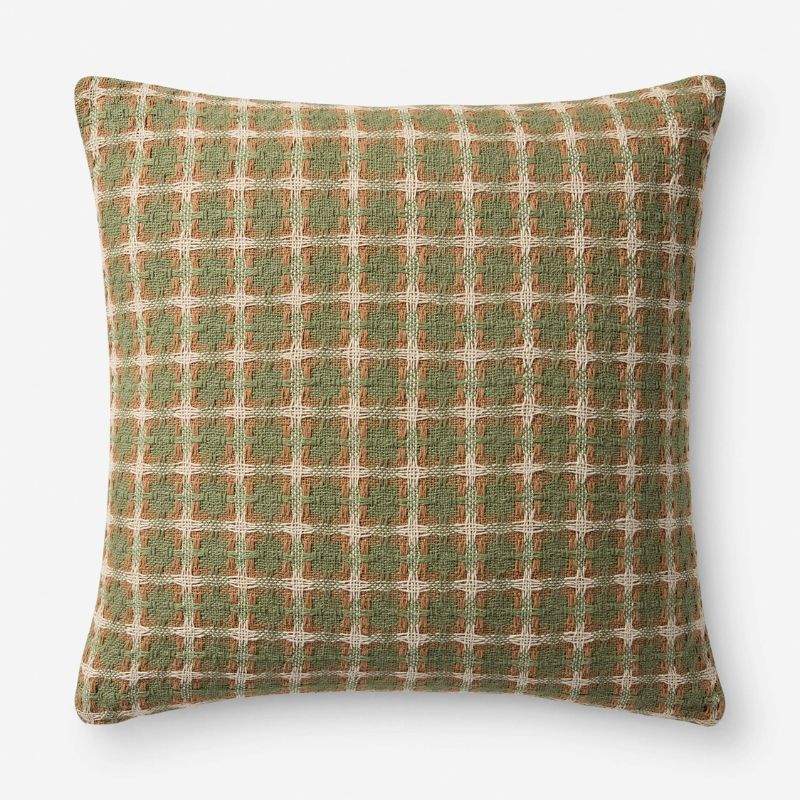 green geometric pattern cushion