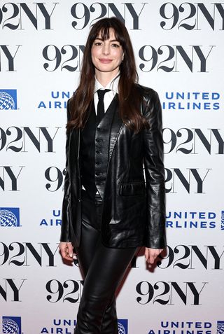 Anne Hathaway wearing a three-piece leather slim suit to the screening and conversation for 'The Idea of You' at teh 92NY in Manhattan April 2024