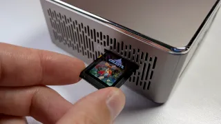 Kazeta OS cartridge and save screen to display the Linux OS' features.