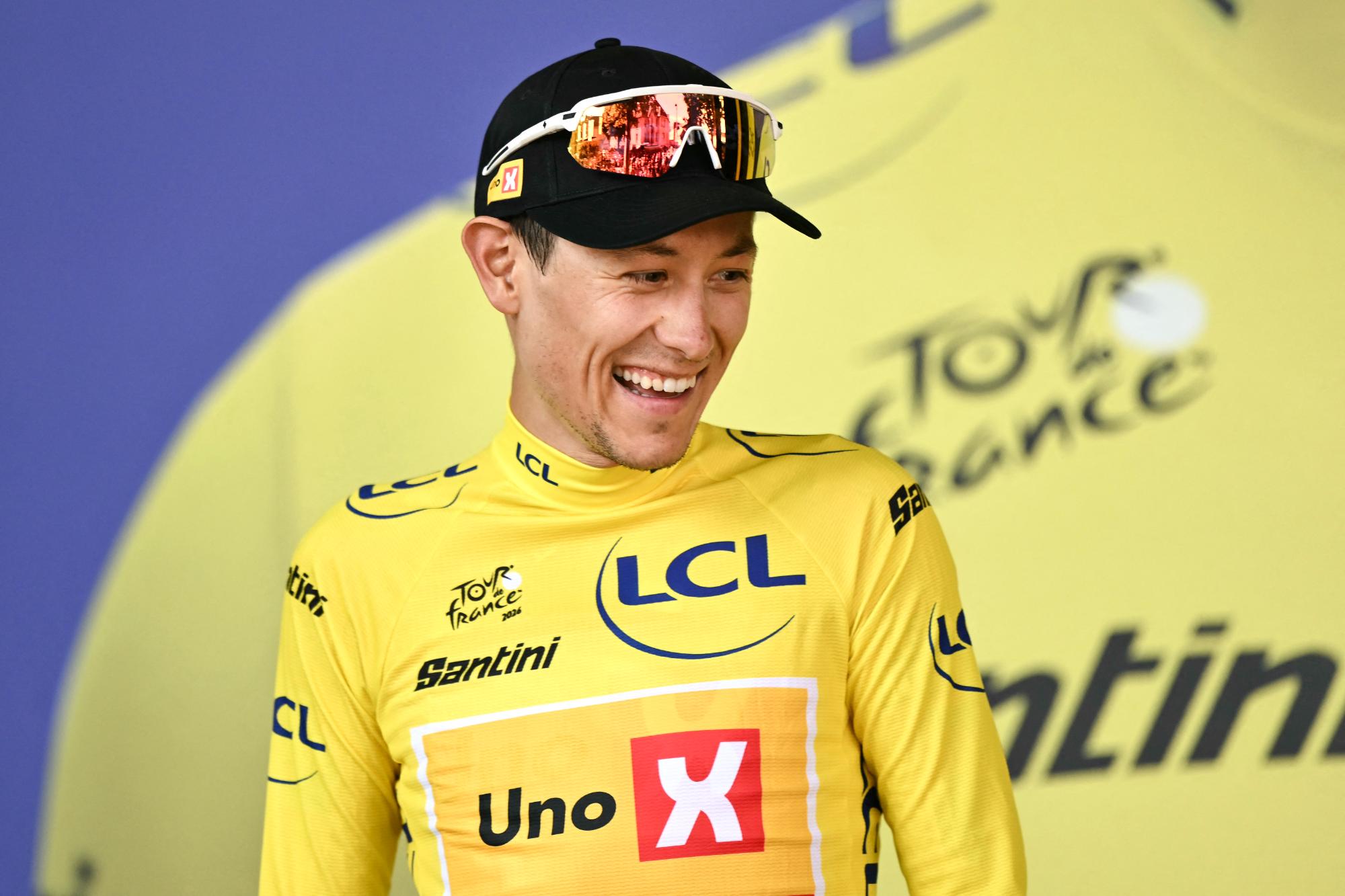 Torstein Tr&amp;aelig;en smiles in the yellow jersey