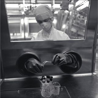 Biologist Elaine Muñoz transfers an Apollo 11 lunar sample in the glove box in NASA Ames’s Lunar Biological Laboratory at the Ames Research Center in Moffett Field, California in 1969.