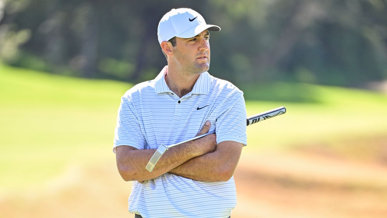 Scottie Scheffler waits to putt on the eighth hole green during the first round of The Genesis Invitational at Riviera Country Club.