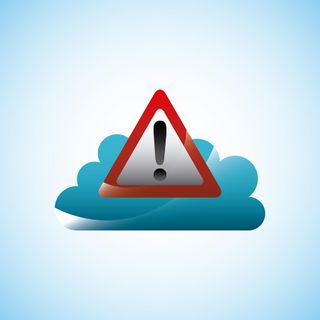 warning triangle on a cloud