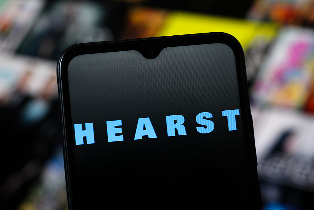 CANADA - 2025/11/08: In this photo illustration, the Hearst Communications logo is seen displayed on a smartphone screen. (Photo Illustration by Thomas Fuller/SOPA Images/LightRocket via Getty Images)