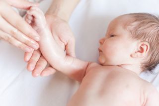 How to massage your baby’s arms and hands