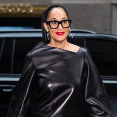Tracee Ellis Ross in a red lip and oversized glasses