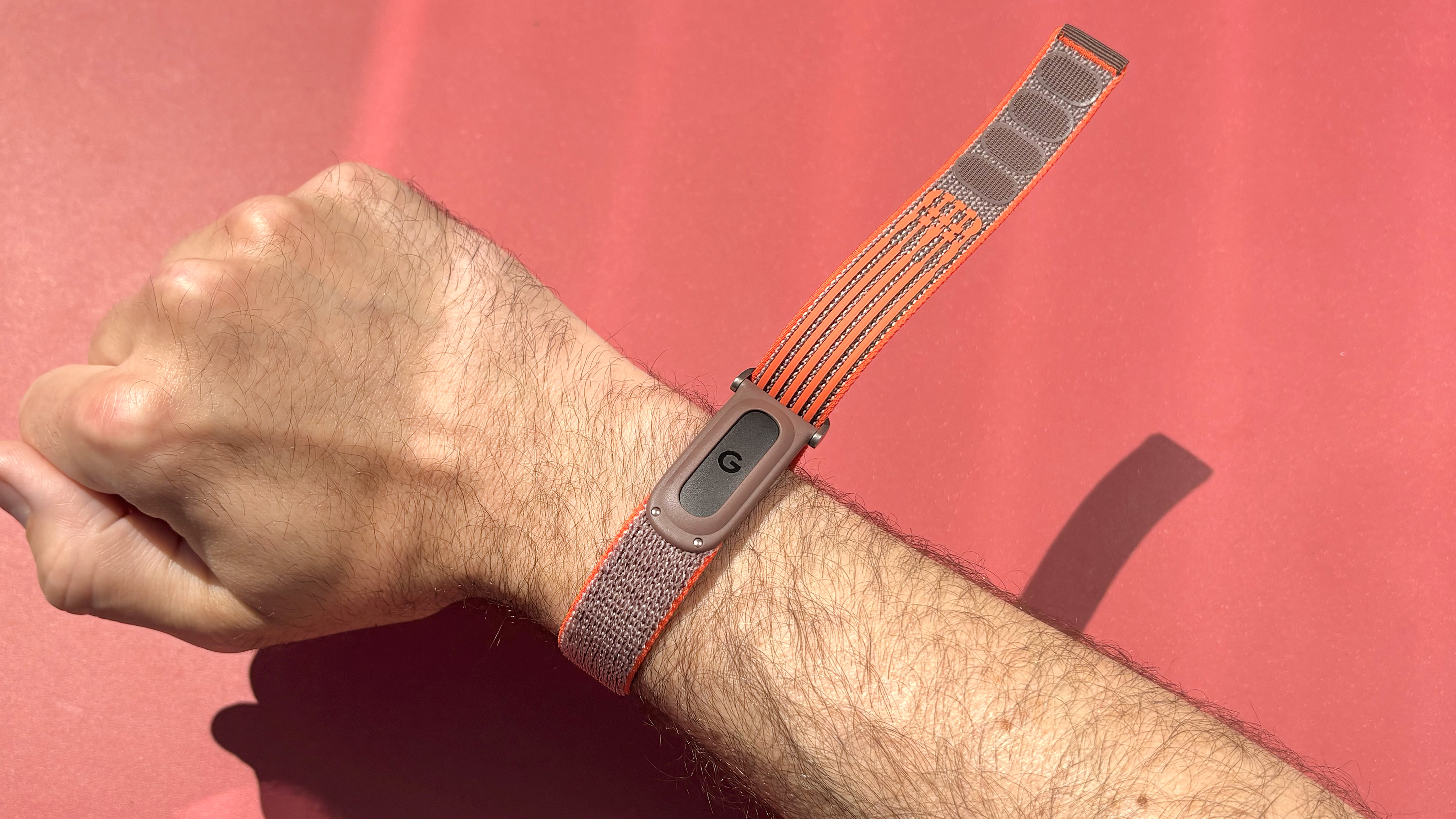Hands-on with the Fitbit Air on the orange and brown Stephen Curry strap