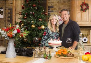 Lisa Faulkner and John Torode pose for their first Christmas as a married couple
