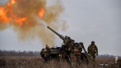 Ukrainian artillery teams fire Pions toward Russian positions in Bakhmut