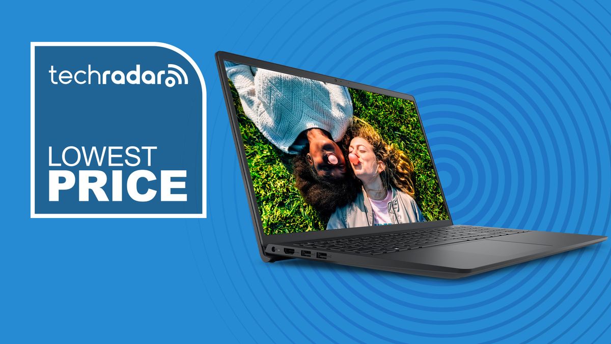 A Dell Inspiron 15 against a TechRadar LOWEST PRICE background