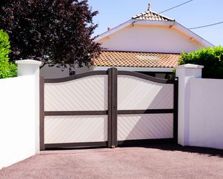 modern white driveway gates