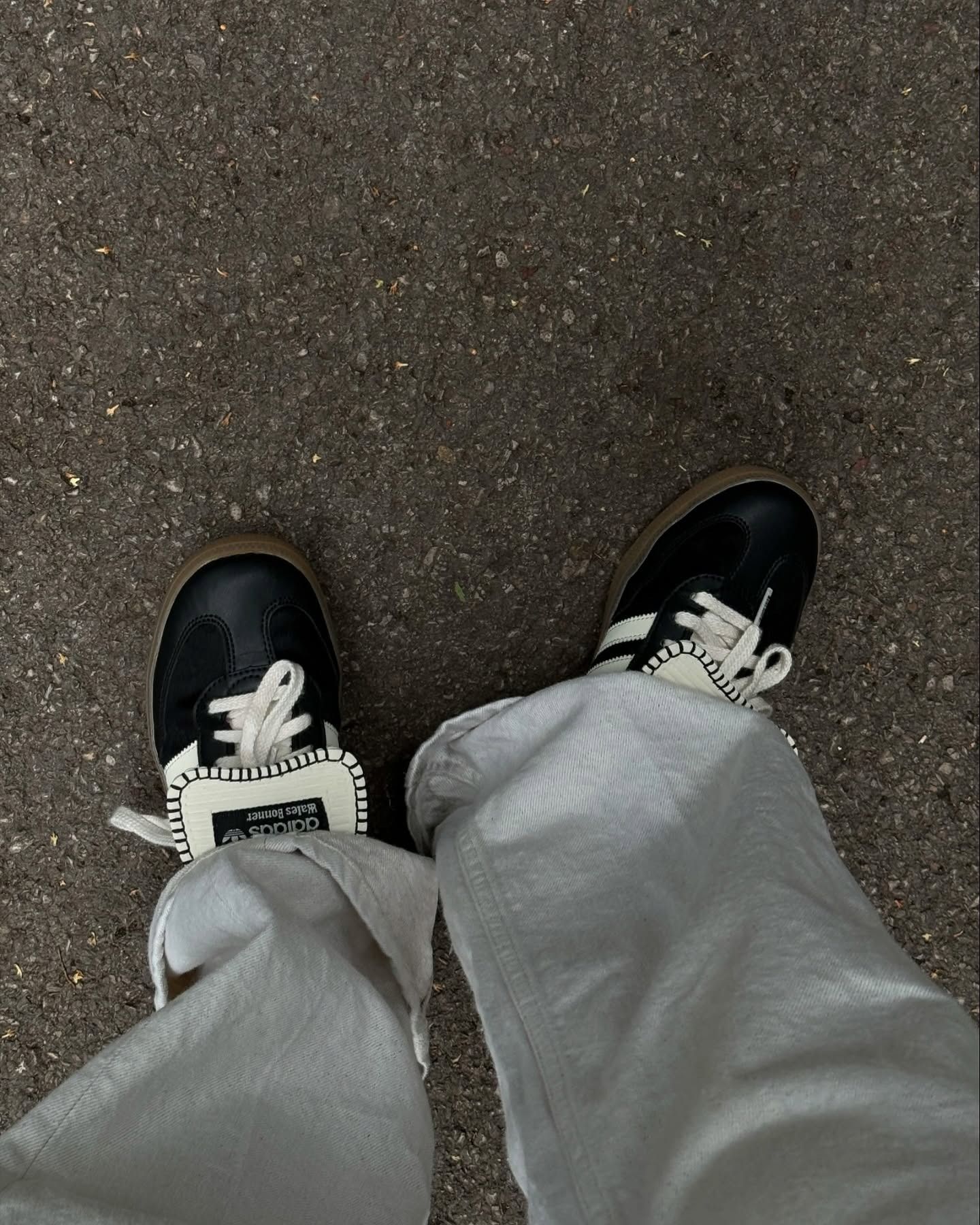 Stylist Hannah Lewis swaps her dated sneakers for a trendier pair in winter 2025. she wears the popular adidas x wales bonner collab in pony hair black and white in a recent image taken from her Instagram.