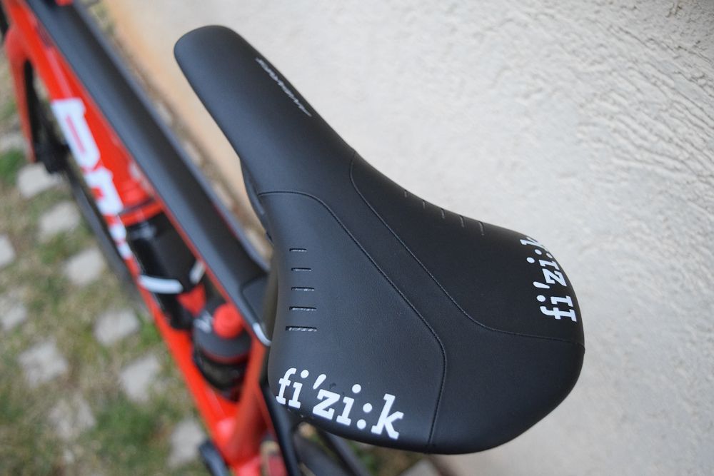 Contrasting white letters on the saddle match the overall design of the BMC