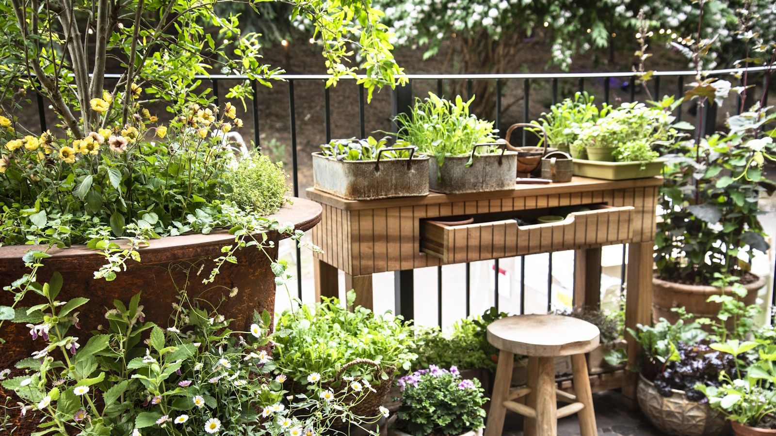 IKEA's 2-in-1 Chic Plant Stand is The Perfect Way To Zone a Balcony or Small Yar...