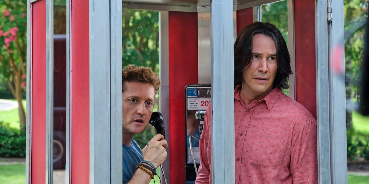 Bill (Alex Winter) and Ted (Keanu Reeves) stand inside of a telephone booth in &#039;Bill and Ted Face the Music&#039;