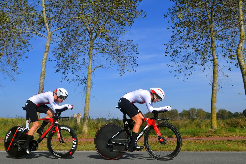 BRUGES BELGIUM SEPTEMBER 22 LR Marlen Reusser of Switzerland and Nicole Koller of Switzerland sprint during the 94th UCI Road World Championships 2021 Team Time Trial Mixed Relay a 445km race from KnokkeHeist to Bruges flanders2021 TT on September 22 2021 in Bruges Belgium Photo by Luc ClaessenGetty Images