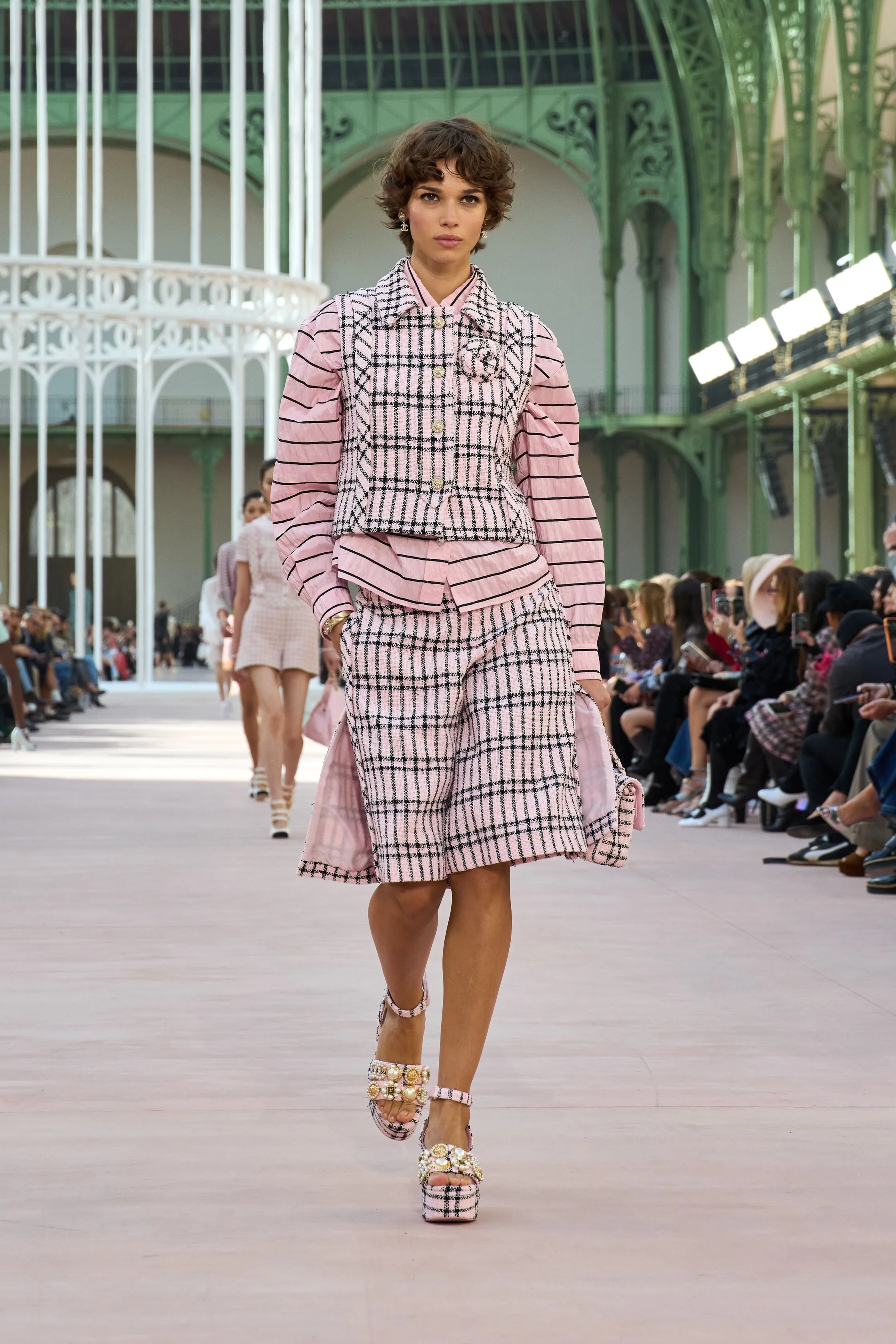 a woman wearing platform pink sandals on Chanel Spring/Summer 2025 runway