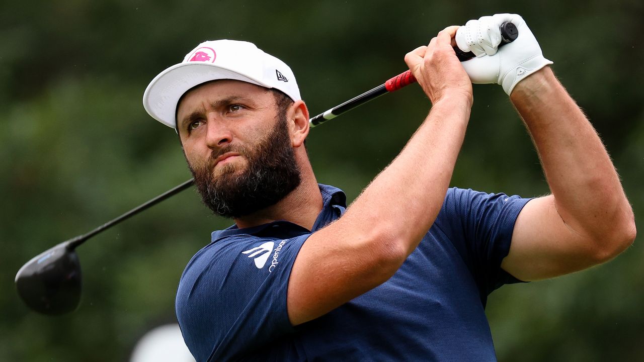 Jon Rahm holds his finish on a drive