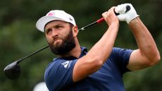 Jon Rahm holds his finish on a drive