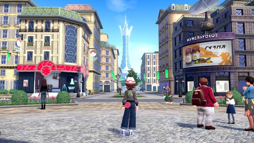 A trainer stands in a City square looking up at a tower in the distance