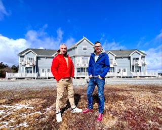Colin and Justin pictured outside their hotel in Nova Scotia, Canada.