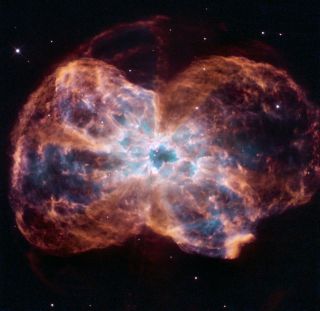 A Hubble Space Telescope image of a red giant shedding its outer layers of gas to become a white dwarf.