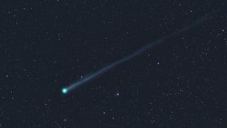 A photo of a bright green comet in space with a long tail