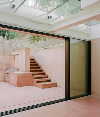 pink house concrete staircase at Pigment House by unknown works