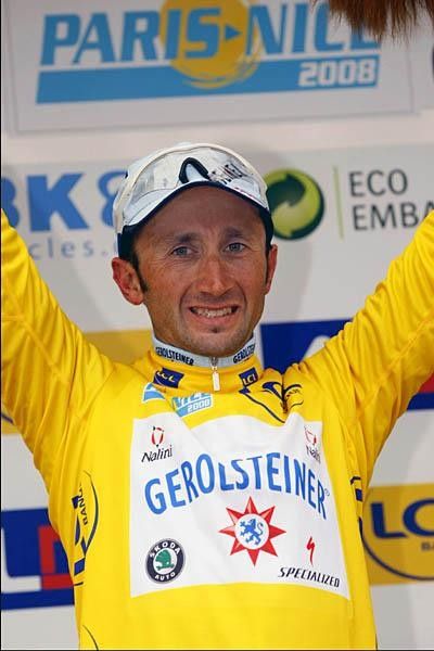 The new yellow man, Davide Rebellin (Gerolsteiner) on the podium.