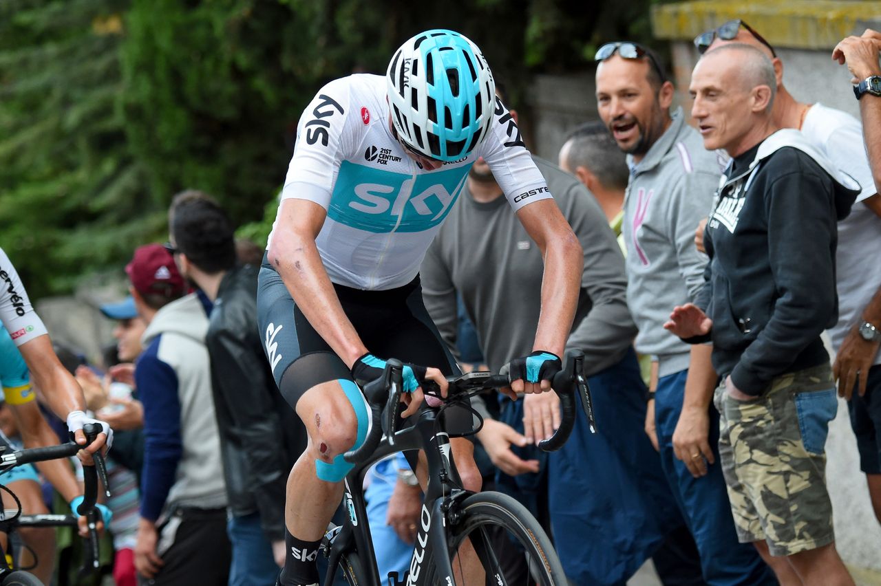 Chris Froome looking down at his stem as usual
