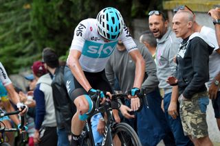 Chris Froome looking down at his stem as usual
