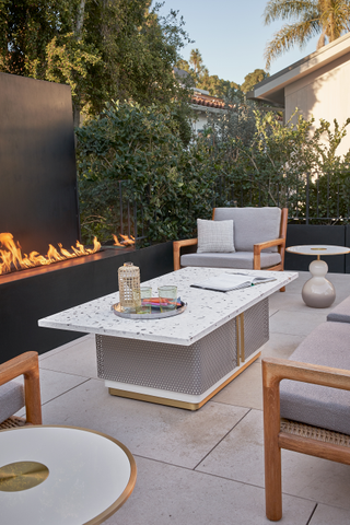 Patio with wall fireplace