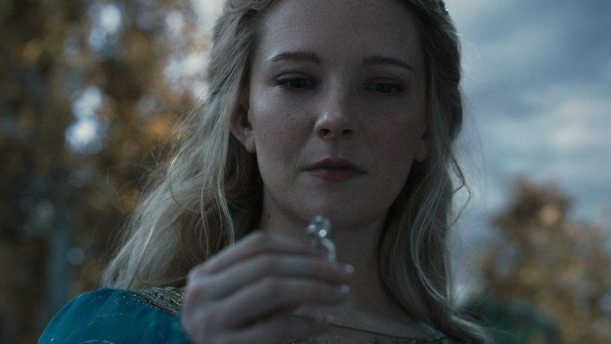 A close-up of Galadriel examining Nenya in The Rings of Power season 2