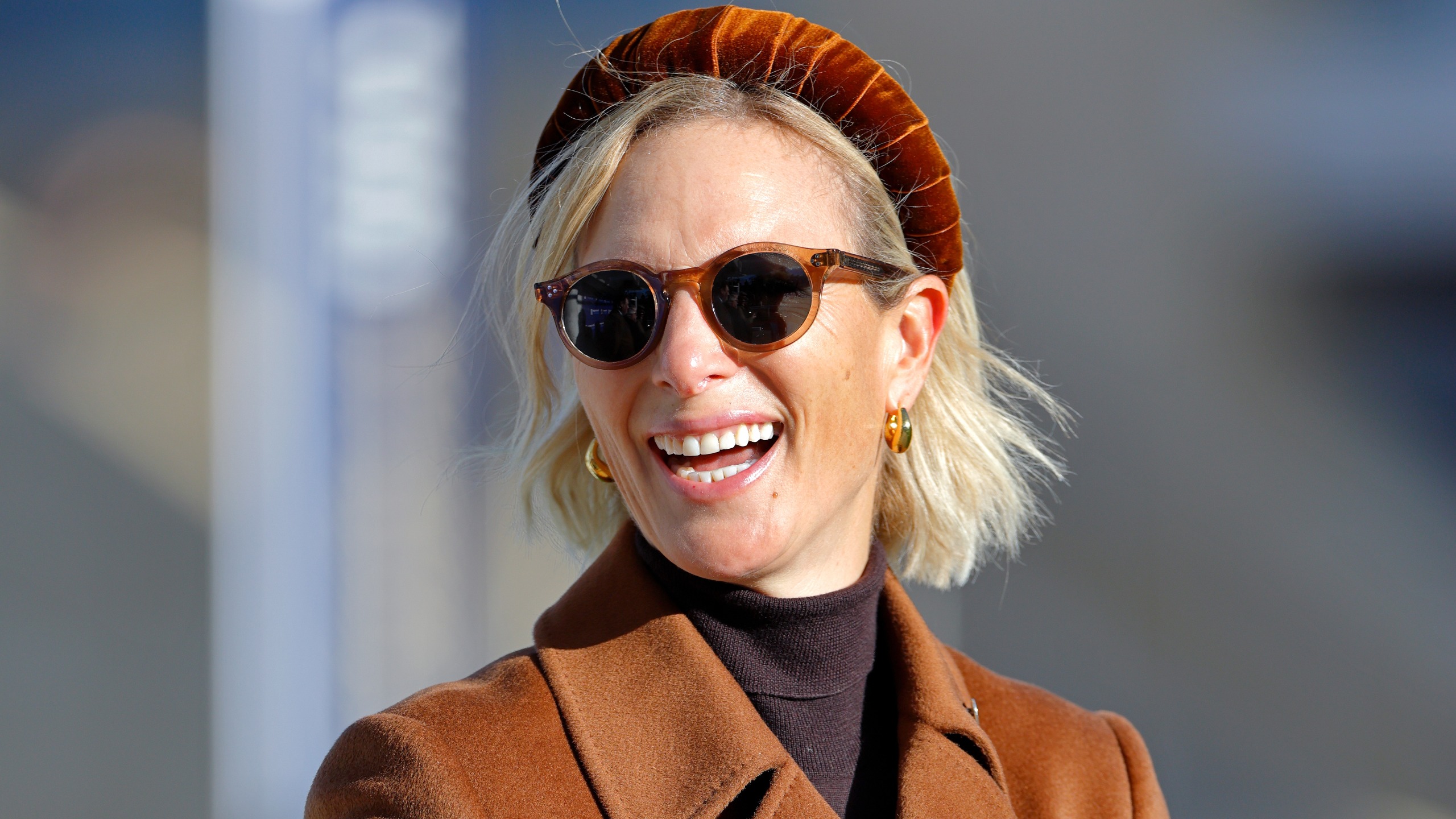 Zara Tindall smiles as she attends day 2 of The William Hill Showcase horse racing meeting at Cheltenham Racecourse on October 25, 2025