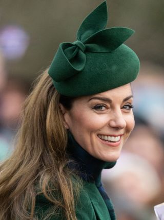 Kate Middleton wears forest green to attend church on Christmas Day in Sandringham with her family, including daughter Princess Charlotte, who wore her hair the same as her mom