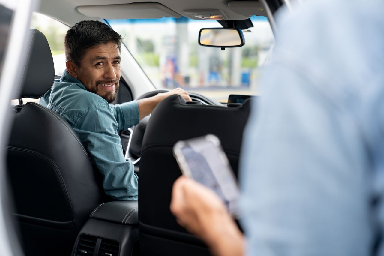 Uber driver picks up passenger