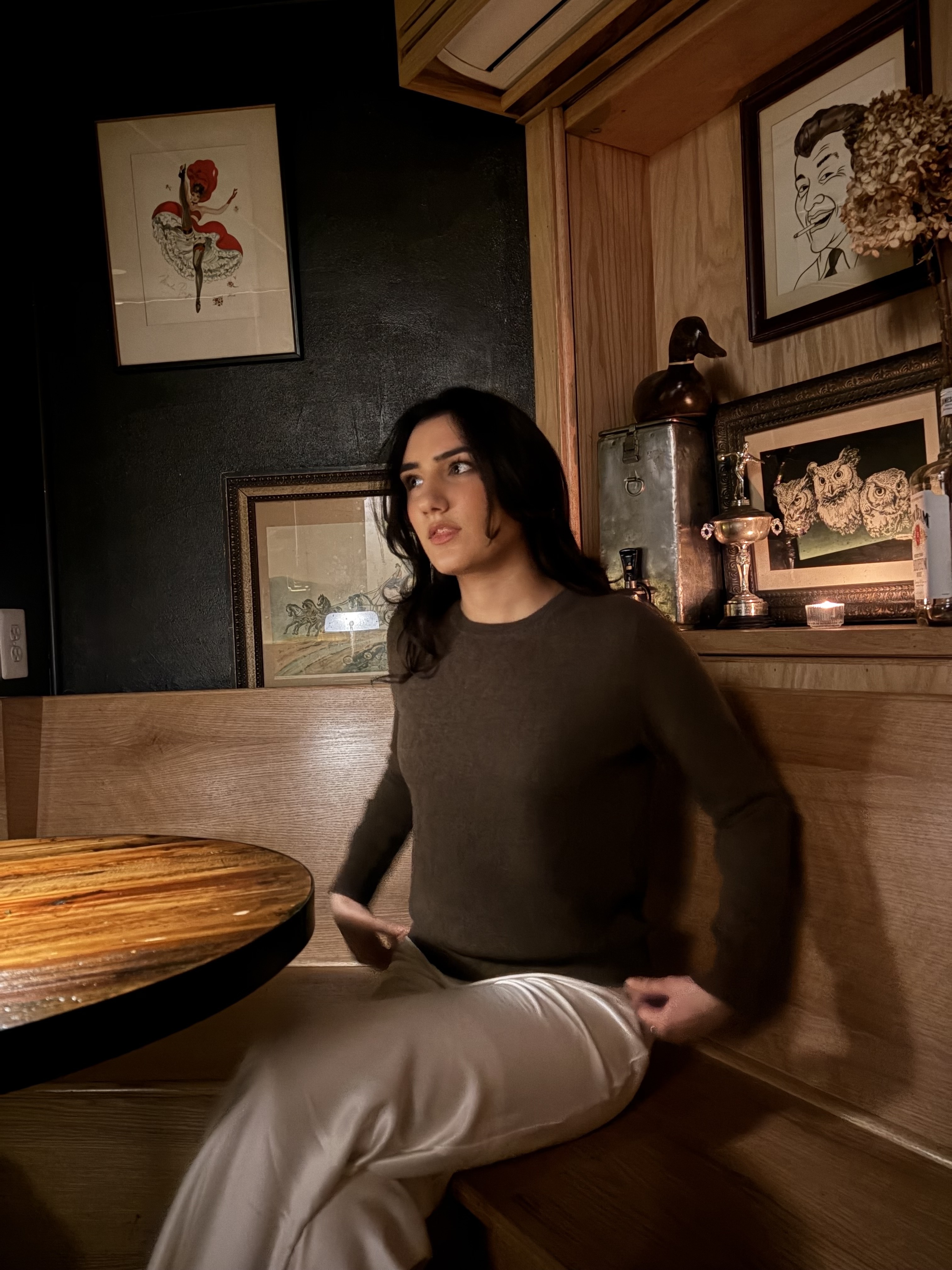 WWW assistant shopping editor wears the Quince Mongolian Cashmere crewneck in brown.