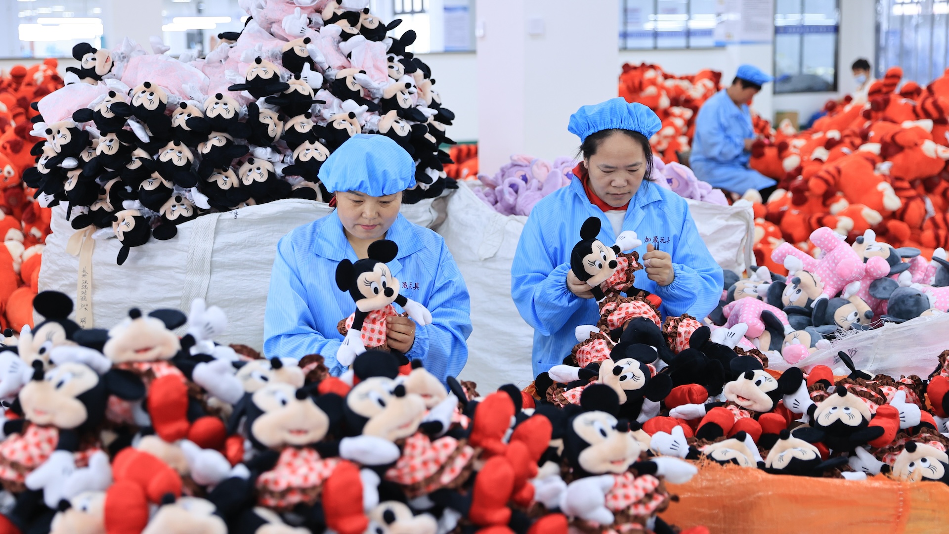 Workers at a Chinese toy factory make stuffed animals