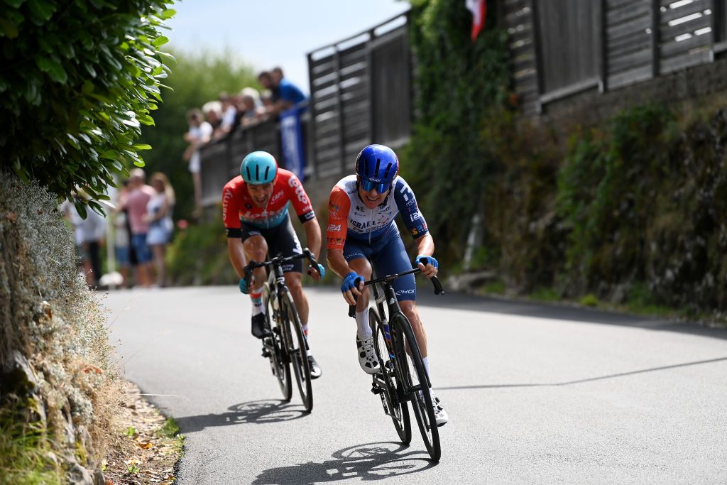 POLIGNY FRANCE JULY 21 LR Victor Campenaerts of Belgium and Team Lotto Dstny and Simon Clarke of Australia and Team IsraelPremier Tech compete in the breakaway during the stage nineteen of the 110th Tour de France 2023 a 1728km stage from MoiransenMontagne to Poligny UCIWT on July 21 2023 in Poligny France Photo by Tim de WaeleGetty Images