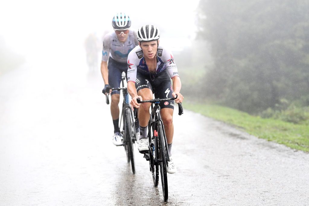 SAN MIGUEL DE AGUAYO SPAIN AUGUST 25 LR Enric Mas Nicolau of Spain and Movistar Team and Remco Evenepoel of Belgium and Team QuickStep Alpha Vinyl compete in the chase group during the 77th Tour of Spain 2022 Stage 6 a 1812km stage from Bilbao to Ascensin al Pico Jano San Miguel de Aguayo 1131m LaVuelta22 WorldTour on August 25 2022 in Pico Jano San Miguel de Aguayo Spain Photo by Justin SetterfieldGetty Images