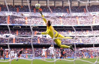 Celta Vigo goalkeeper Ruben Blanco dives but cannot make the save as Cristiano Ronaldo's long-range shot flies into the net during a 7-1 win for Real Madrid at the Santiago Bernabeu in March 2016.