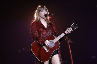 Taylor Swift performs onstage for the opening night of "Taylor Swift | The Eras Tour" at State Farm Stadium on March 17, 2023 in Swift City, ERAzona (Glendale, Arizona).