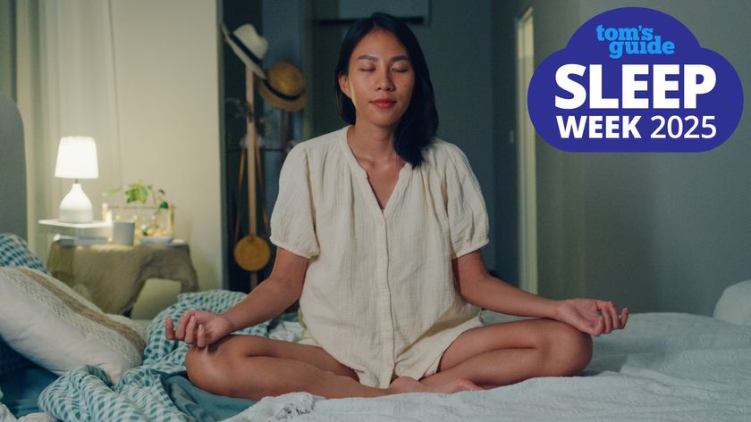 A woman sits on her bed meditating to try to fall asleep, a Tom&#039;s Guide Sleep Awareness Week 2025 graphic (right)