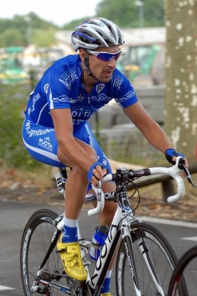 Agritubel's R&eacute;mi Cusin helps keep the breakaway going.