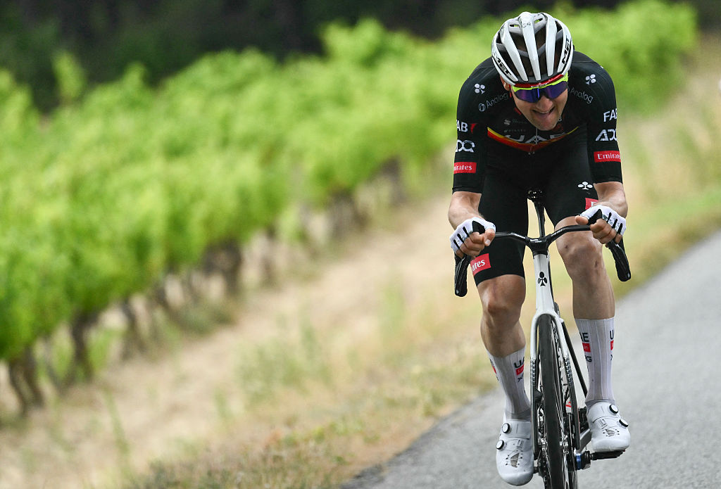 UAE Team Emirates - XRG team's Belgian rider Tim Wellens cycles in a lone breakaway in front during the 15th stage of the 112th edition of the Tour de France cycling race, 169.3 km between Muret and Carcassonne, southwestern France, on July 20, 2025. (Photo by Marco BERTORELLO / AFP)