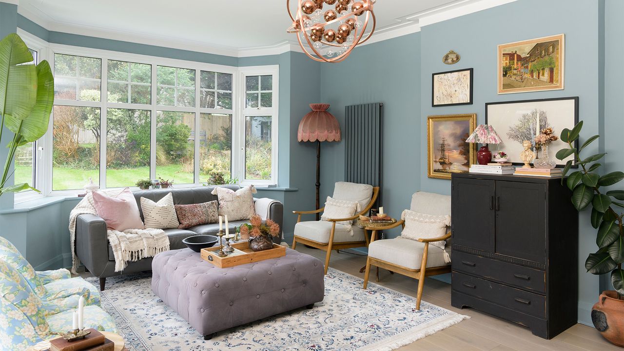 blue living room with grey sofa