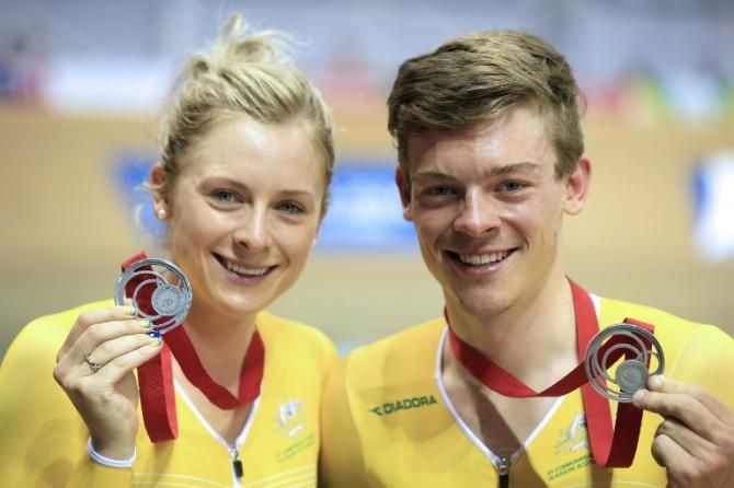 Annette and Alex Edmondson show off their medals